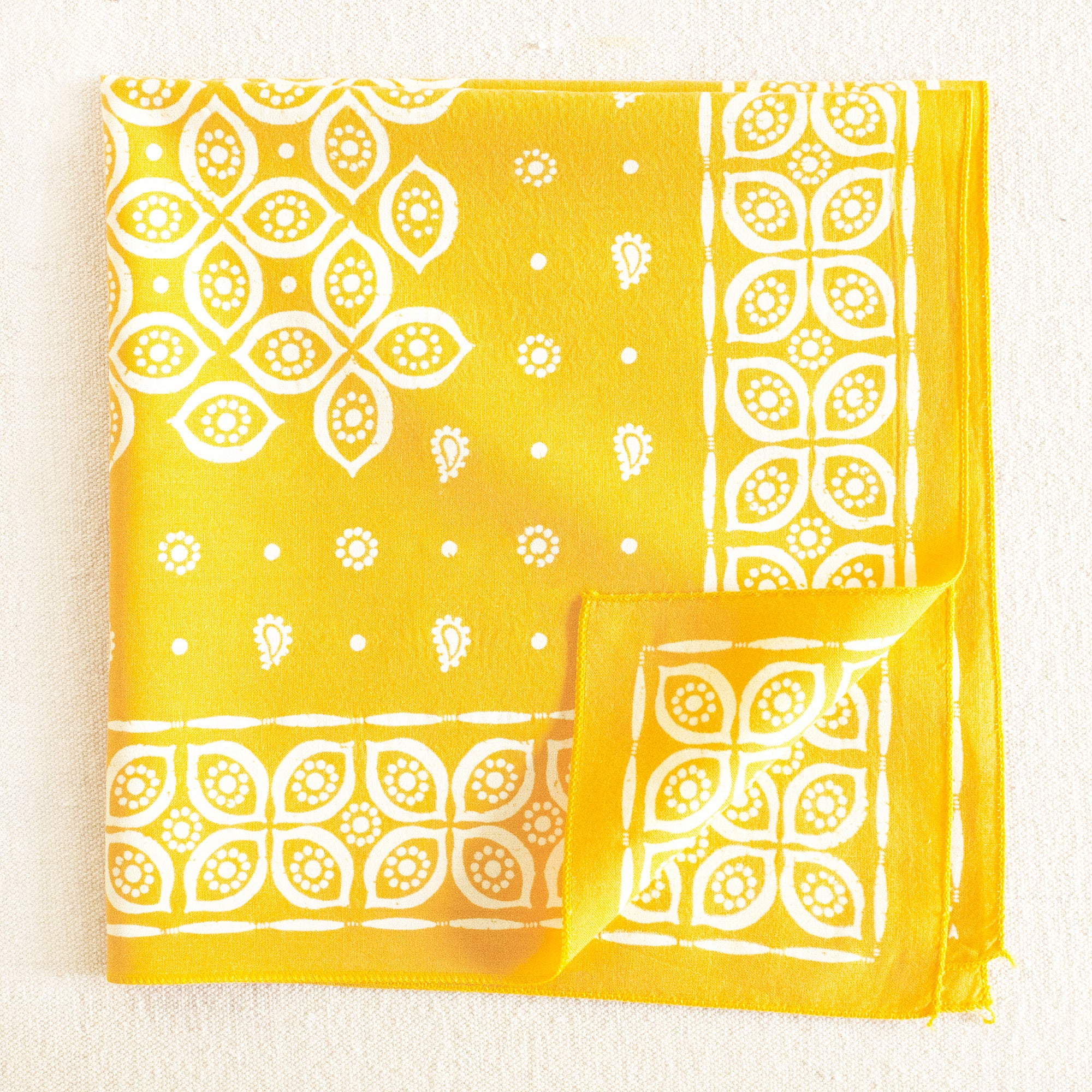 yellow hand printed paisley bandana