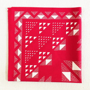 red and white geometric bandana folded