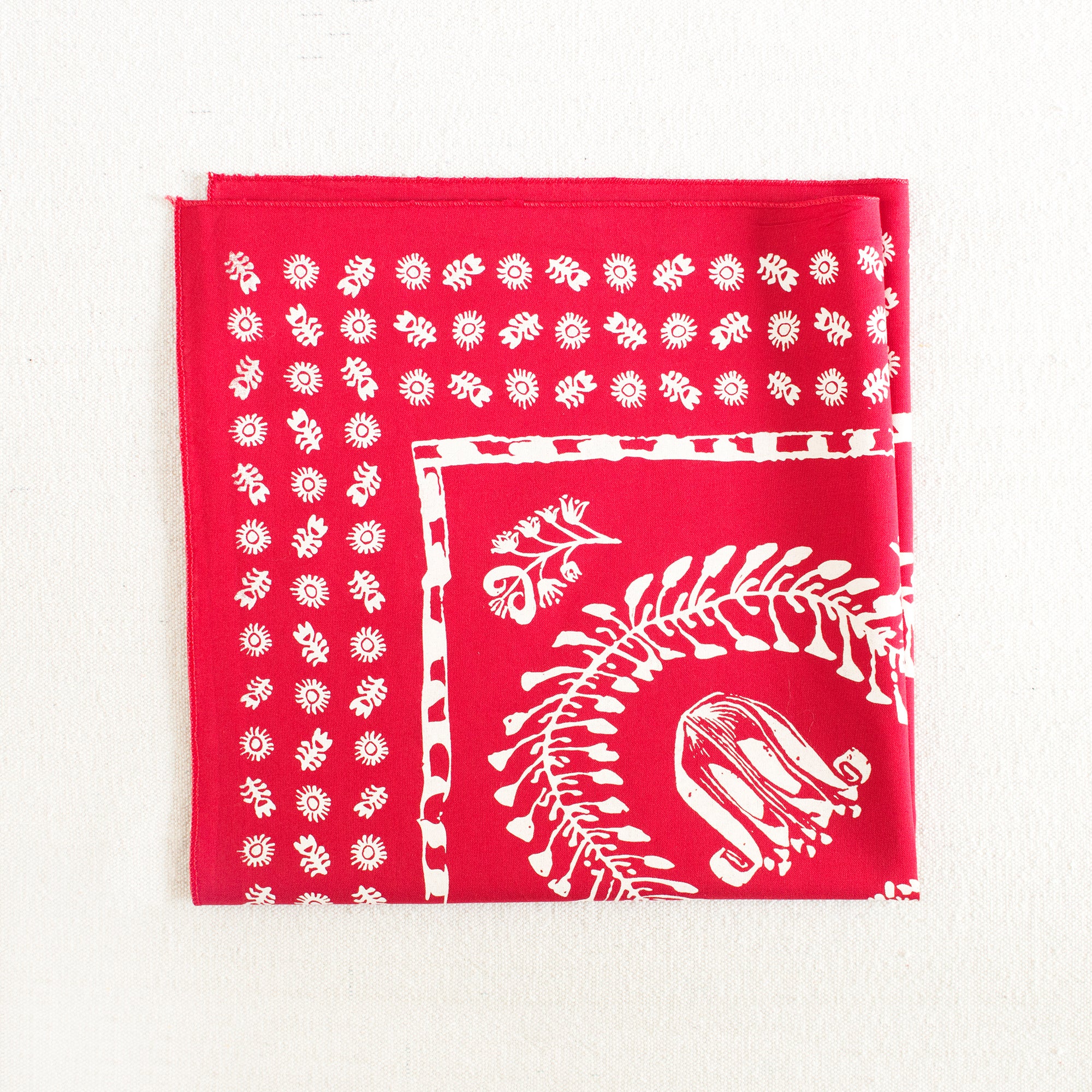 red floral bandana folded